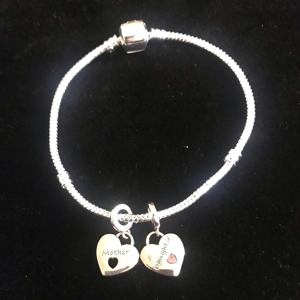 Sterling silver charm bracelet with 2 charms - Picture 1 of 2